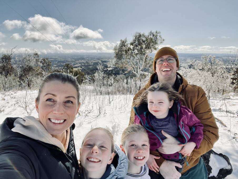 SNOW MUCH FUN: New to Orange, the Seth family - Jade, Ivy, Violet, Florence and Michael - headed to the top of Mount Canobolas on Wednesday morning for some snow-filled action. Photo: CONTRIBUTED.