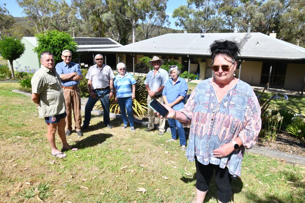East Cabonne residents literally disconnected from the world, with John Spicer, Ray Astill, Harry White, Sue Gore, Ted and Narelle Lewis, and Learne Spicer. Picture by Jude Keogh.