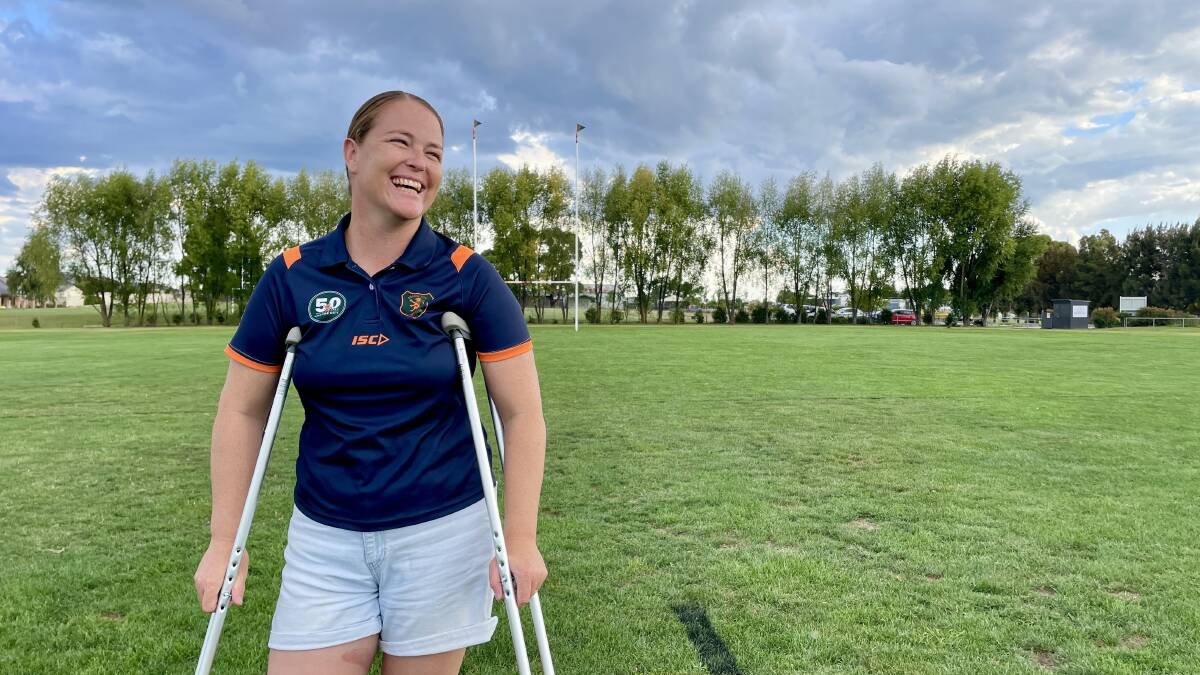 Karina Kiley from Orange City Rugby Union Club says with the help of her children, partner and the rugby club, she's been able to start smiling again. Picture by Emily Gobourg.