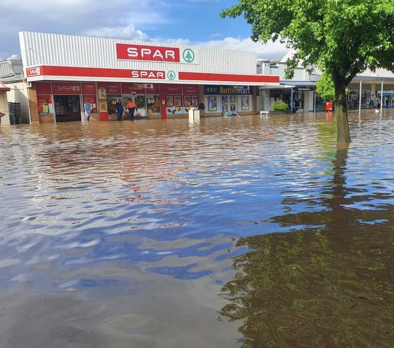 THROWBACK: Many Bank Street traders had their store fronts quickly engulfed with floodwaters when flash flooding hit on November 26, 2021. Photo: SUPPLIED.