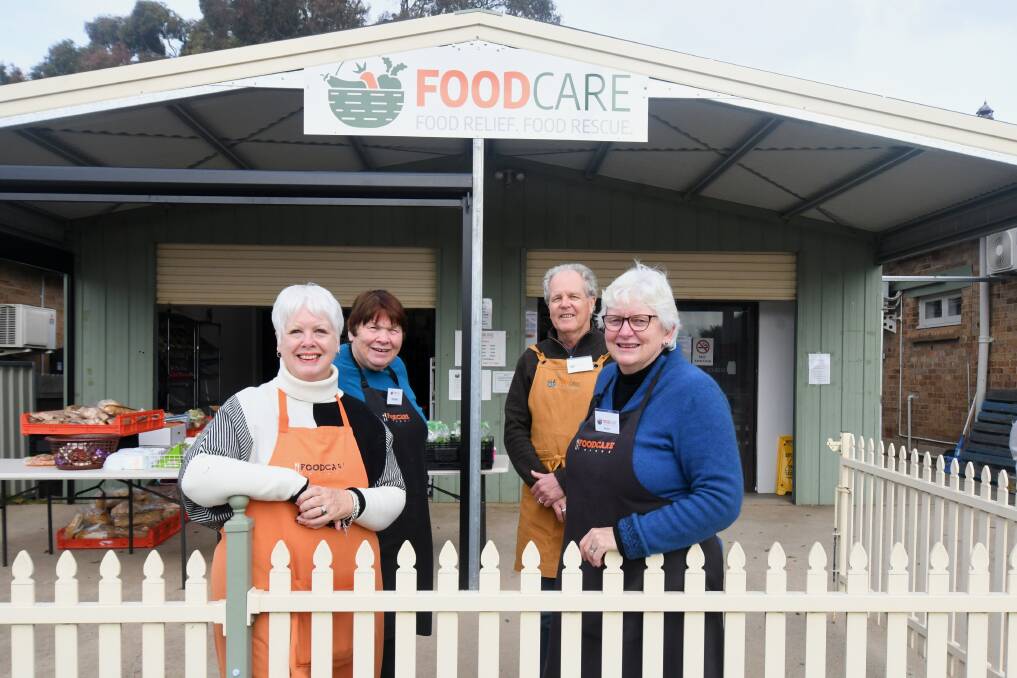 WORKERS KEPT: Orange FoodCare was "very fortunate" to keep its unpaid workers during COVID while operating as an essential service, with volunteers Jennifer Derrick, Heather Huthnance, Neil Moon and Kerrie Nicholls. Photo: CARLA FREEDMAN.