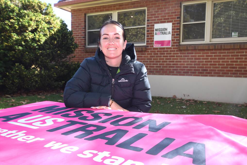 STEADY GOAL: Mission Australia's Codie Campbell brings regular information sessions to Bowen and Glenroi residents, with residents saying their annoyance with services in the past has been due to inconsistency. Photo: JUDE KEOGH.