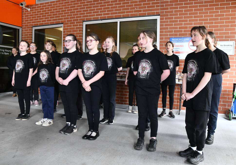 The Wula Gurray (Voice of Change) Choir performed for the NAIDOC event at Orange Health Service on Tuesday. Picture by Jude Keogh.