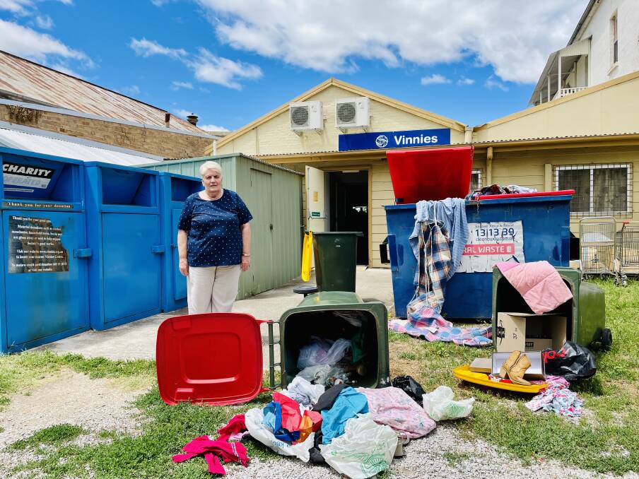 CHARITY GROUNDS TRASHED: Molong's Vinnies Shop president, Mary Mulhall, felt extremely disheartened when she learned the charity grounds at the back of the store were broken into and trashed. Photo: EMILY GOBOURG.