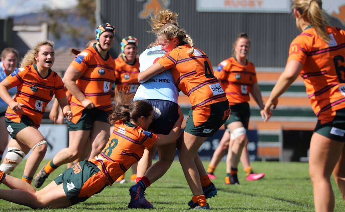 Jorja Lees with Orange City Lions tackles a Dubbo Roos player during the 2023 season. Picture supplied.