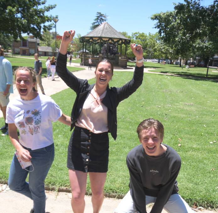 SCHOOL'S OUT: Orange High School's Ellie Giger, Claudia Smith and Sam Murphy were pumped with their results; taking out double-digits in Band 6 results across subjects between the three of them. Photo: JUDE KEOGH.