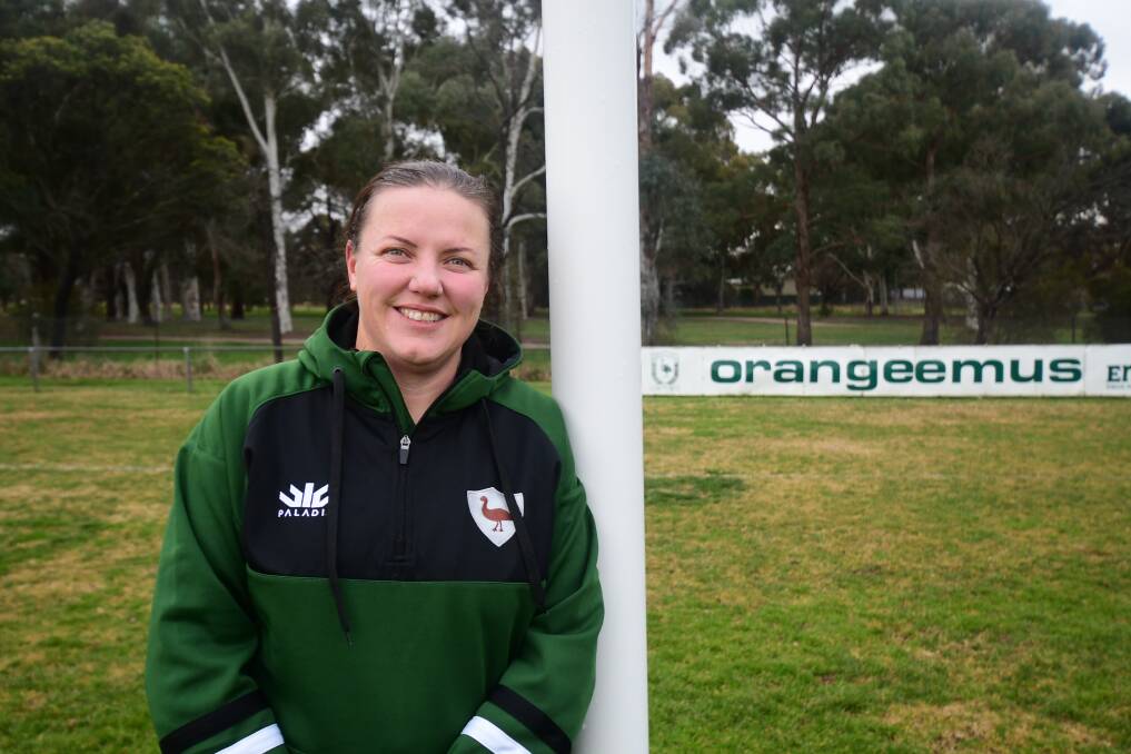 LIVING THE DREAM: Buildcorp Wallaroos team manager, Amanda Ferguson has lived and breathed rugby for 21 years. Photo: CARLA FREEDMAN.
