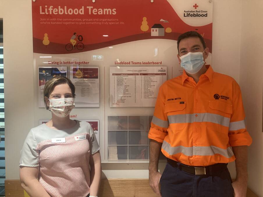 TAKE THE CHALLENGE: Liesa Pansini, Orange Donor Centre Manager and Justin Betts from Cadia's Community Partnership Program are proud to see the new Lifeblood Teams Board, which will generate healthy competition in the community. Photo: SUPPLIED.