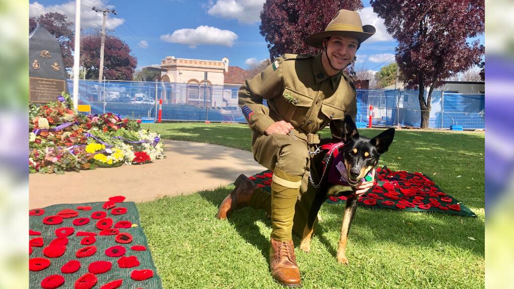 Steven Williams with his Kelpie dog Victor on Anzac Day in Molong wearing a replica World War One uniform. Picture by Emily Gobourg.