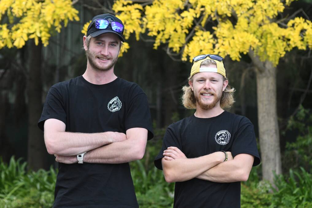 100K TARGET: Ellis Johnson and Lachlan McCann have created a platform for those in need. Photo: JUDE KEOGH.