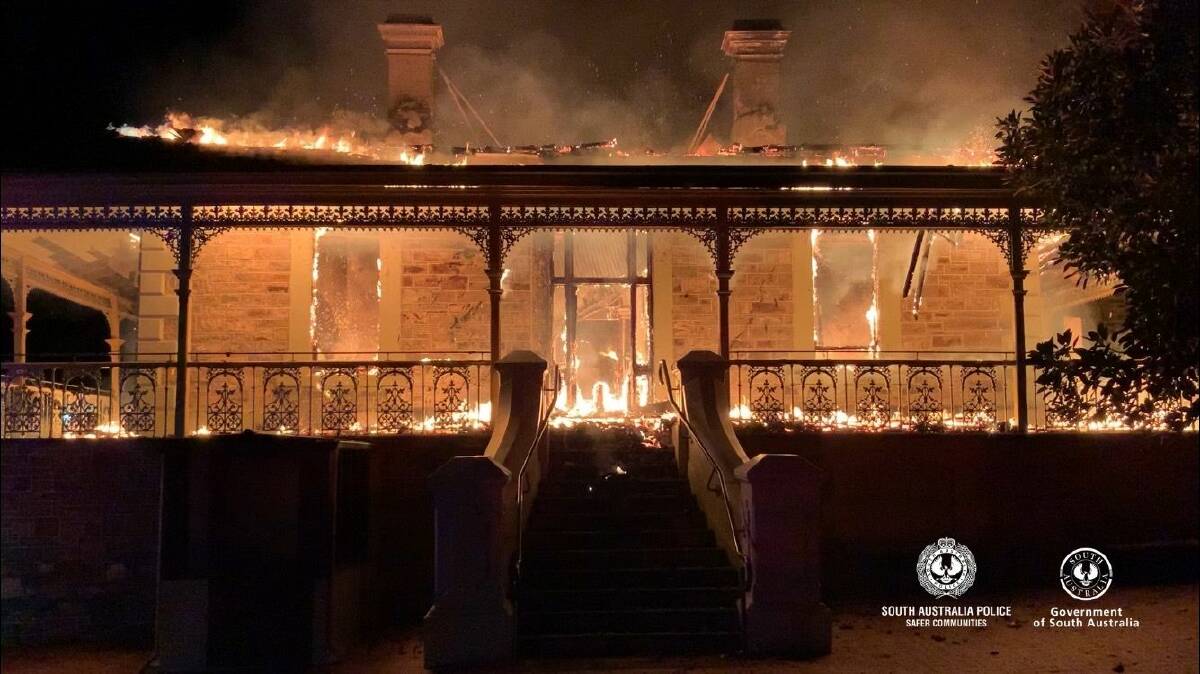 ABLAZE: Sir Sidney Kidman's former home, Eringa, went up in flames last night at its current location of Kapunda High School. Picture: SAPOL