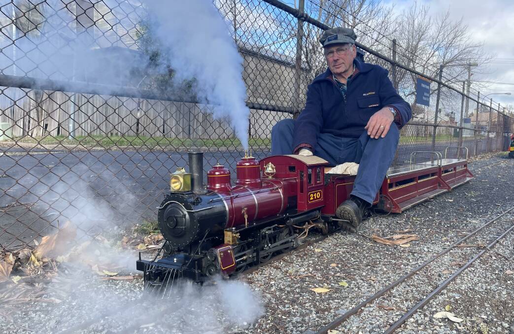 Percy Suckling with his scale steam train at Matthews Park, Orange. 