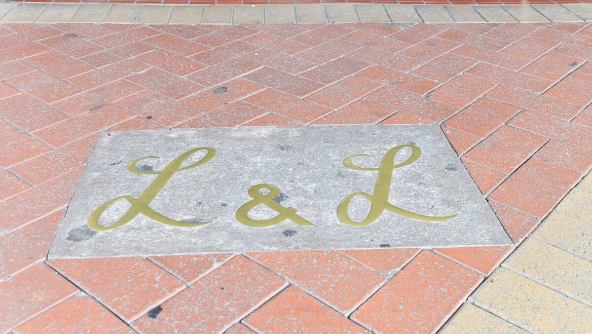 L&L and RM brass footpath inlays on Summer Street, Orange. Picture by Carla Freedman. 