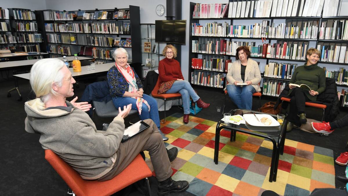 Pageturners book club meeting at Orange library. From left to right: Paul Anderson, Peggy Gough, Lynda Kerr, Lesley Smith, and Jan Fenwick.
