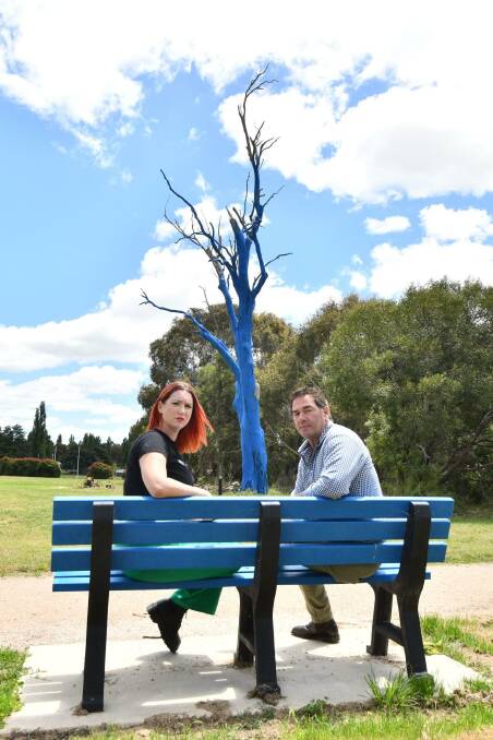 Orange Region Suicide Prevention Network chair Bernie Allen (left) and Orange City Councillor Tony Mileto (right) at the new Blue Bench and Blue Tree in Pilcher Park, Orange. Picture by Carla Freedman. 