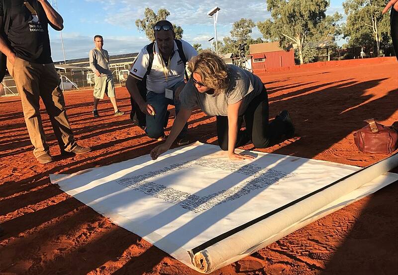 Signing the Uluru Statement from the Heart in 2017. 