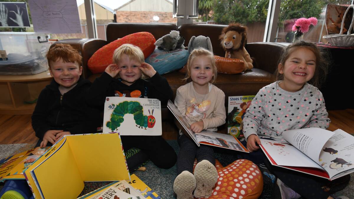Readers at Orange Preschool. From left to right: Bailey McAnulty, Hudson Carr, Ava Crooks, and Addison Bettinzoli. 