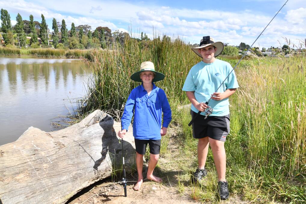 Sam McConnachie and Luca Gaeta fishing at the Ploughmans Wetlands in Orange. Picture by Carla Freedman. 