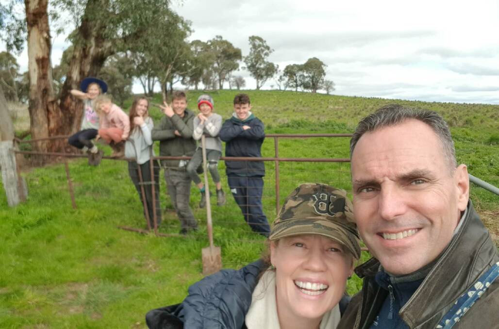 Arrested former US fighter pilot Daniel Duggan with wife Saffrine Duggan and children Molly, Finn, Rory, Jack, Hazel, and Ginger at Forest Reefs property near Orange. Picture supplied. 