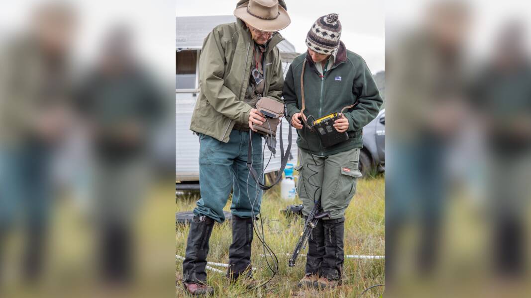 Michael Clarke and Liz Wemyss checking radio tracking equipment. Picture by Marcia Riederer/DELWP.