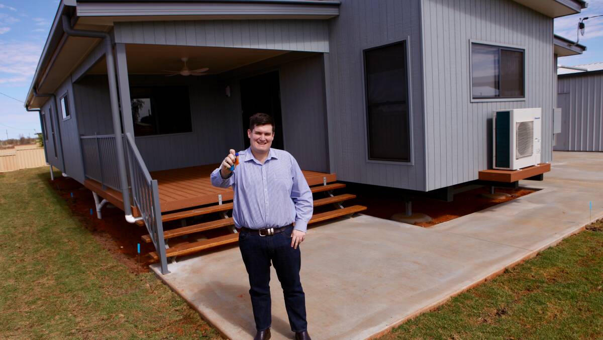 Quilpie Shire Council chief executive Justin Hancock out the front of his new house, after initially living in a retirement village due to housing shortages. Picture by Leon O'Neil.