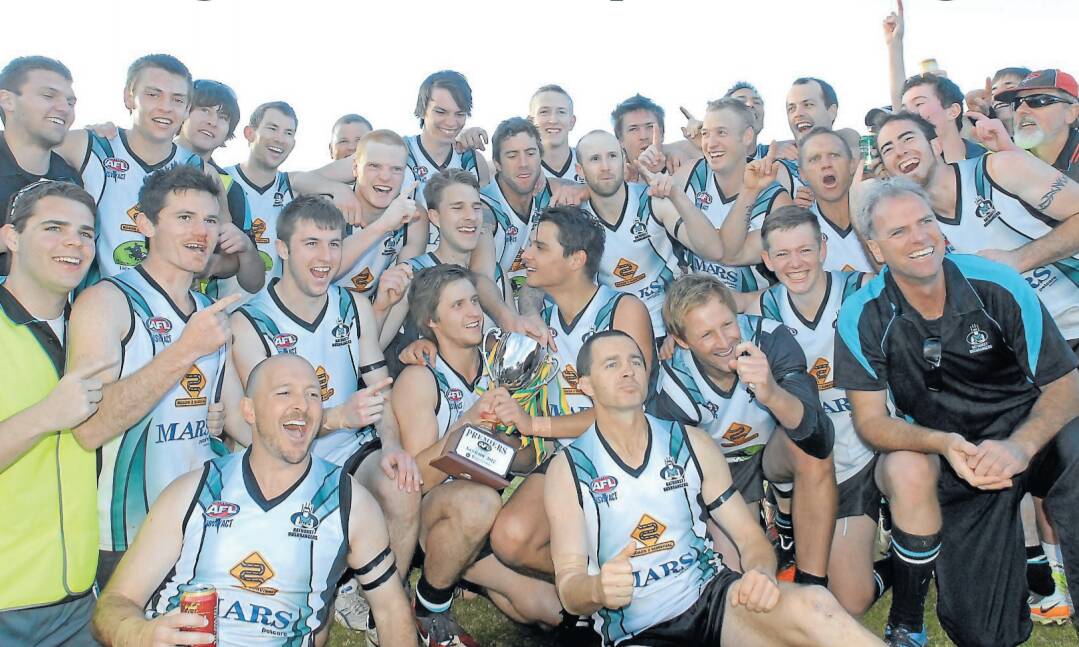YOU BEAUTY: The Bathurst Bushrangers were elated after winning the 2012 Central West AFL grand final over Cowra at George Park. Photo: CHRIS SEABROOK