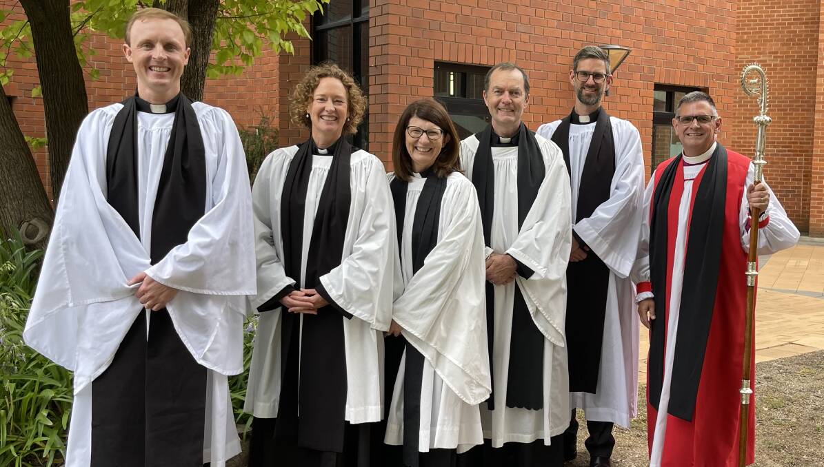 ORDAINED: James Daymond, Bec Choi, Sally and Roger Phelps, Ben Mackay and Bishop Mark Calder. Photo: CONTRIBUTED