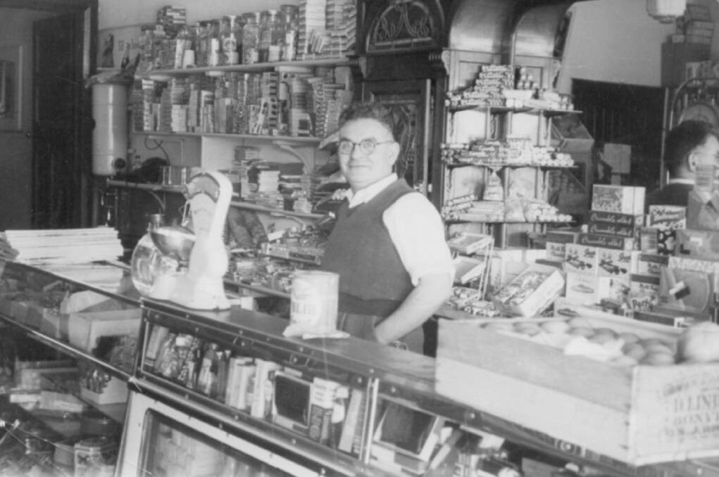 READY TO SERVE: Anthony Kaloutsis behind the counter of his shop in the late 1950s or early 1960s. 118 Summer Street will - hopefully - house another business after being closed as a shop front for almost 50 years.