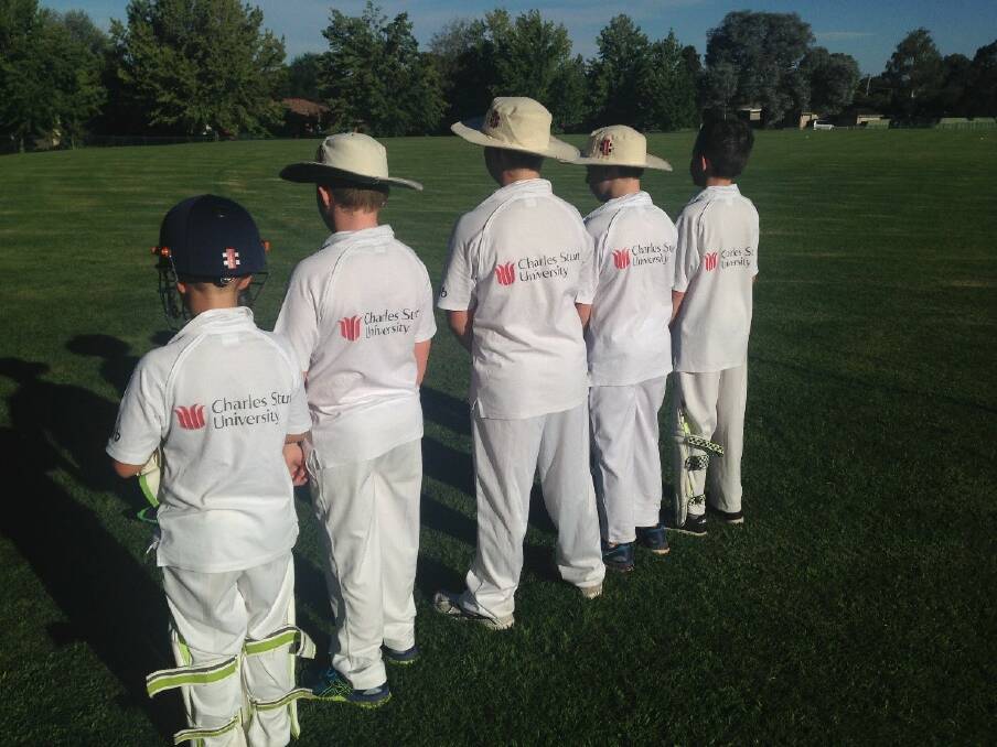 Looking Good: Members of the Waratah’s U11 cricket team wearing their CSU badged shirts.