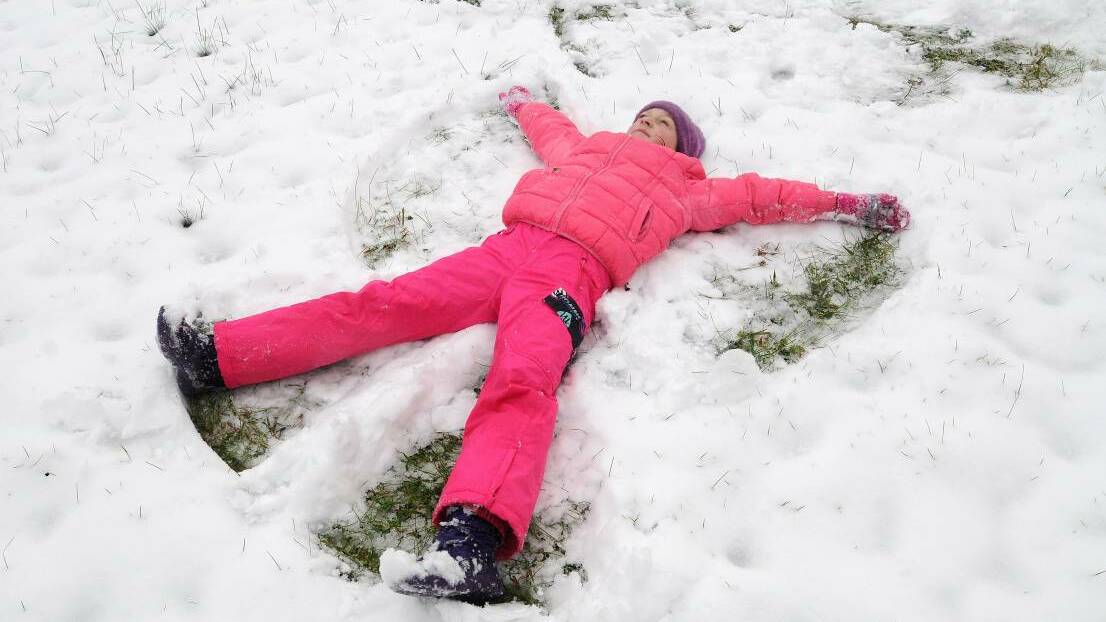 WINTER WONDERLAND: Dasha Nagornova enjoying the snow in Orange in previous years. Photo: STEVE GOSCH