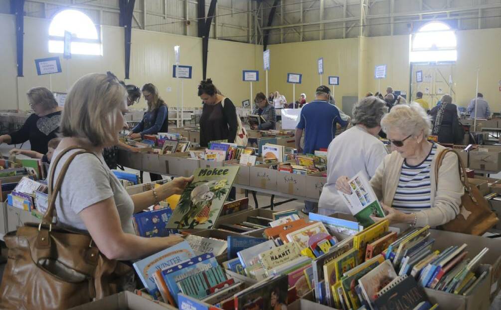 ALWAYD POPULAR: Leafing through the options at the 2017 book fair.