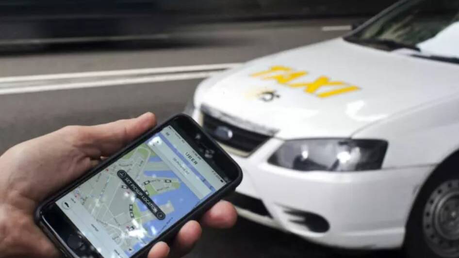 COMPARE THE PAIR: Orange residents will soon be able to choose between taxis and Ubers.