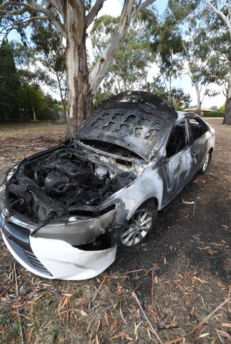 ANOTHER ONE: A burned-out and destroyed car found in Orange this week. Photo: JUDE KEOGH
