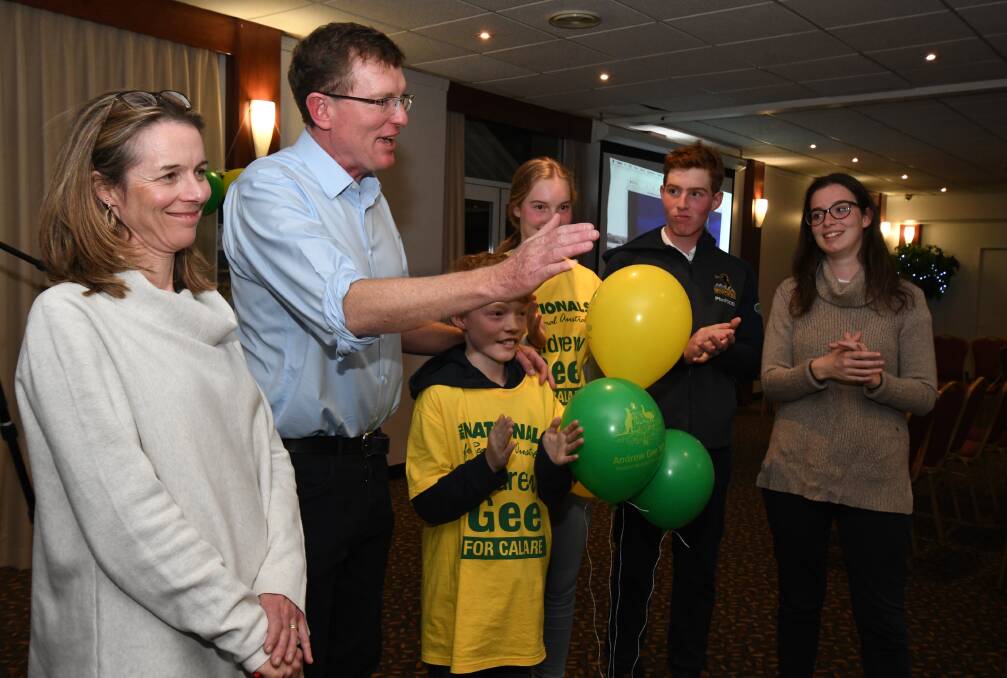CELEBRATING: Returned member for Calare Andrew Gee with his family and supporters on Saturday night. Photo: JUDE KEOGH