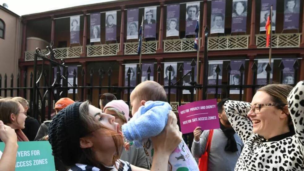 FOR THEIR CAUSE: Supporters of creating a safe access zone around abortion clinics gather outside NSW Parliament House. Photo: SYDNEY MORNING HERALD