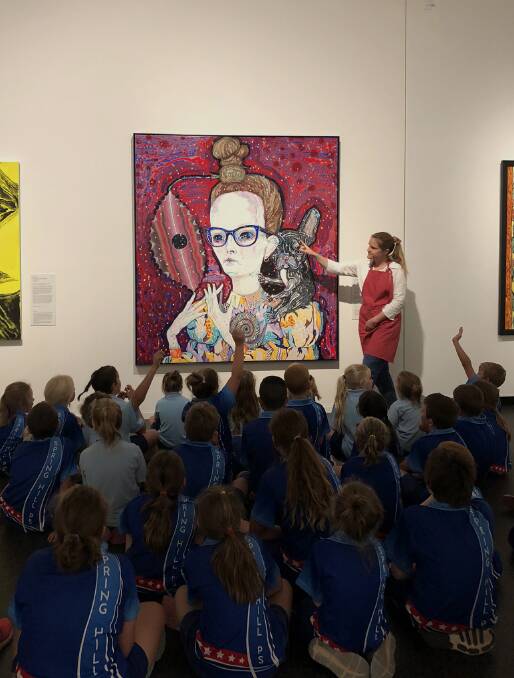 MEMORABLE: Spring Hill Public School students with Orange Regional Gallery's Public Engagement and Education Officer Cecilie Knowles. Photo: SUPPLIED