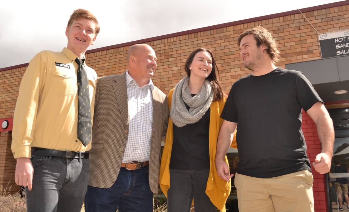 HAPPY ENDING: Orange City rugby coach Steve Hamson (second from left) with CSU students Andrew Fraser, Emma Curtin and Jack Keppel.