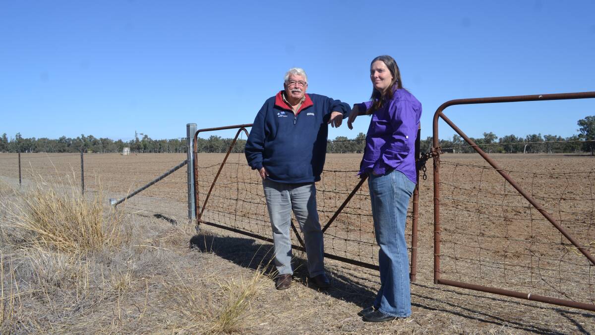 ON THE LAND: Aussie Helpers co-founder Brian Egan and volunteer Krystal Haycock, a farmer from Yeoval, prepare to assist the region. Photo: FAYE WHEELER
