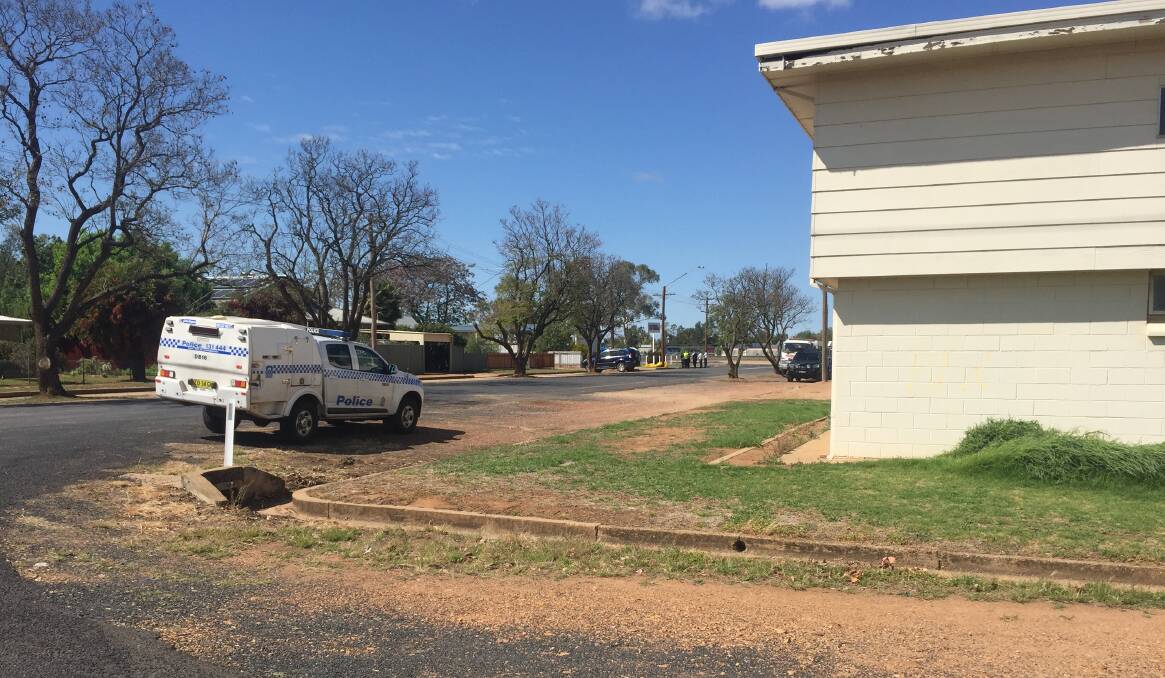 AT THE SCENE: Police and emergency services in Narromine on Sunday morning.