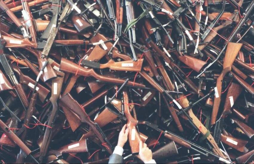 BACK THEN: Guns that were handed in as apart of the John Howard government's National Firearms Agreement following the Port Arthur massacre. Photo: SYDNEY MORNING HERALD