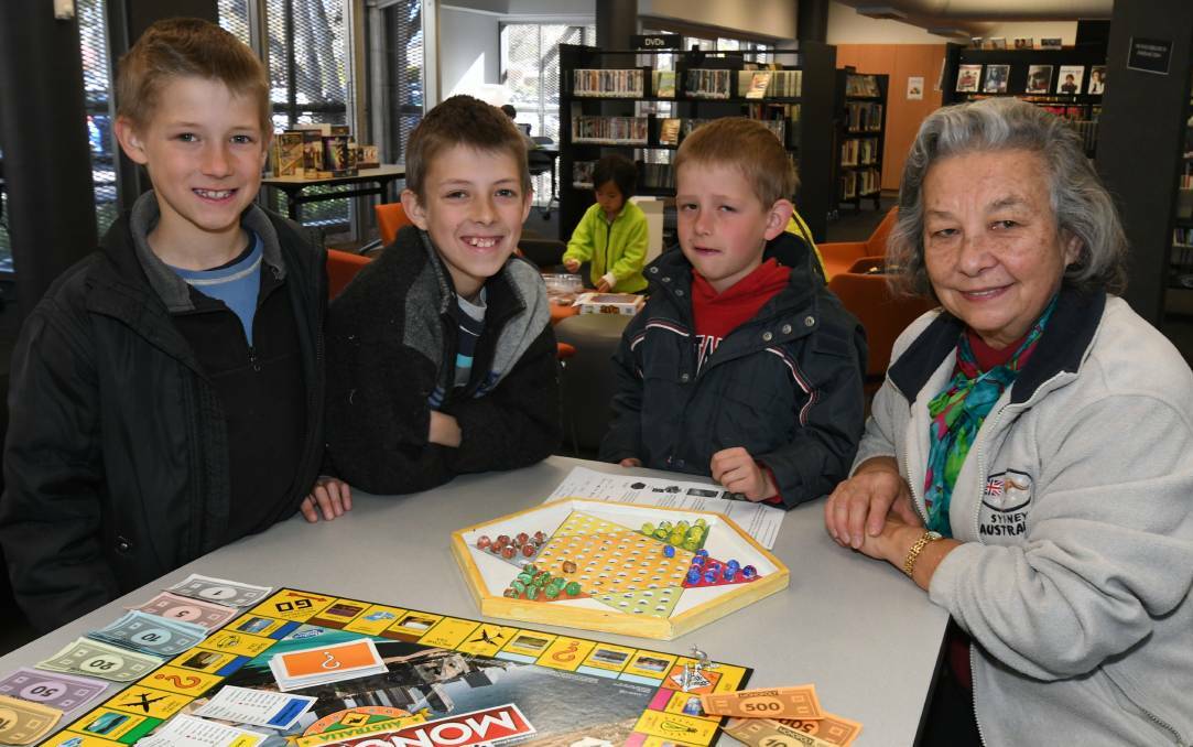 FAR FROM BOARD: Adam, Daniel, James and Lucy Skrinnikoff at the last board games day. Photo: JUDE KEOGH