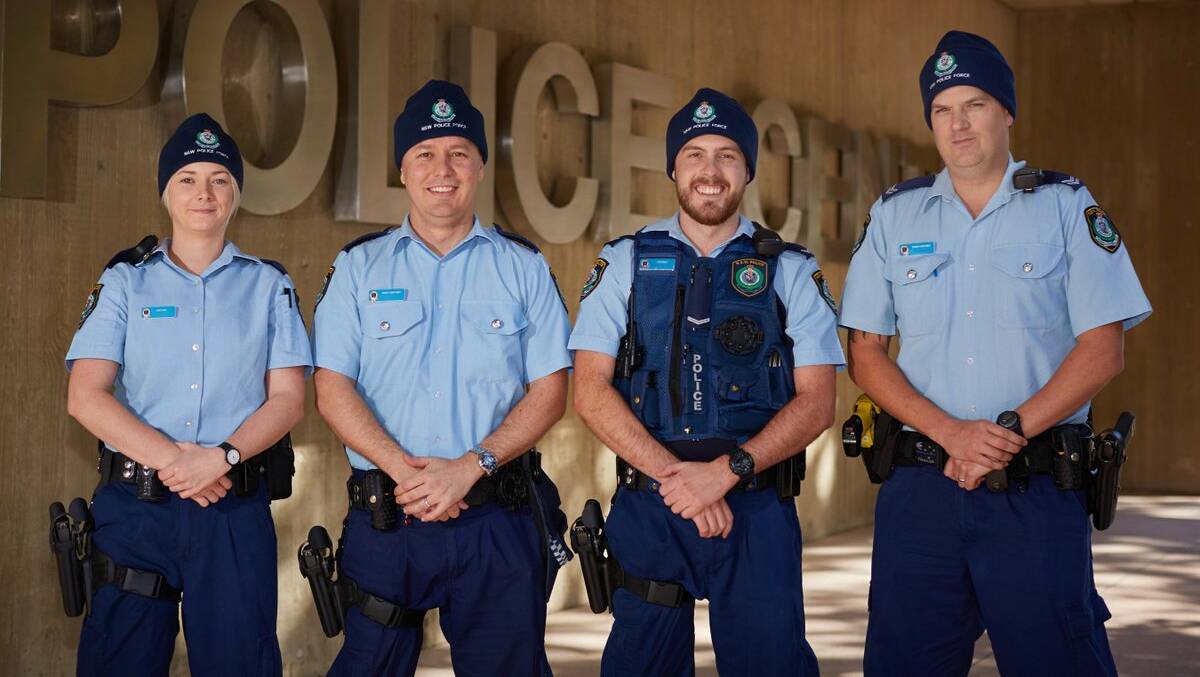 SHARP AND PRACTICAL: Police sporting beanies. Photo: TWITTER