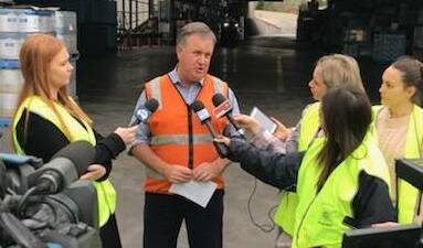 WHAT HAPPENED?: Manildra Flour Mills manager John Brunner facing the media after the explosion. Photo: SUPPLIED