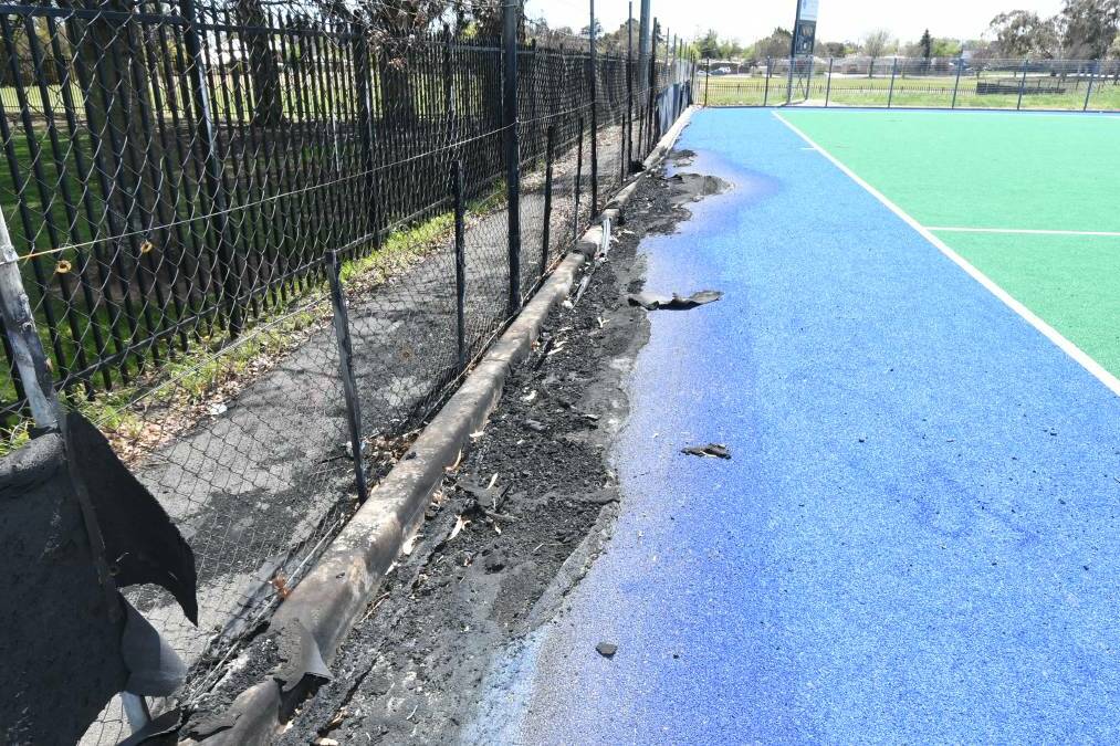 DAMAGE DONE: The burned surface of a pitch at Orange Hockey Centre.