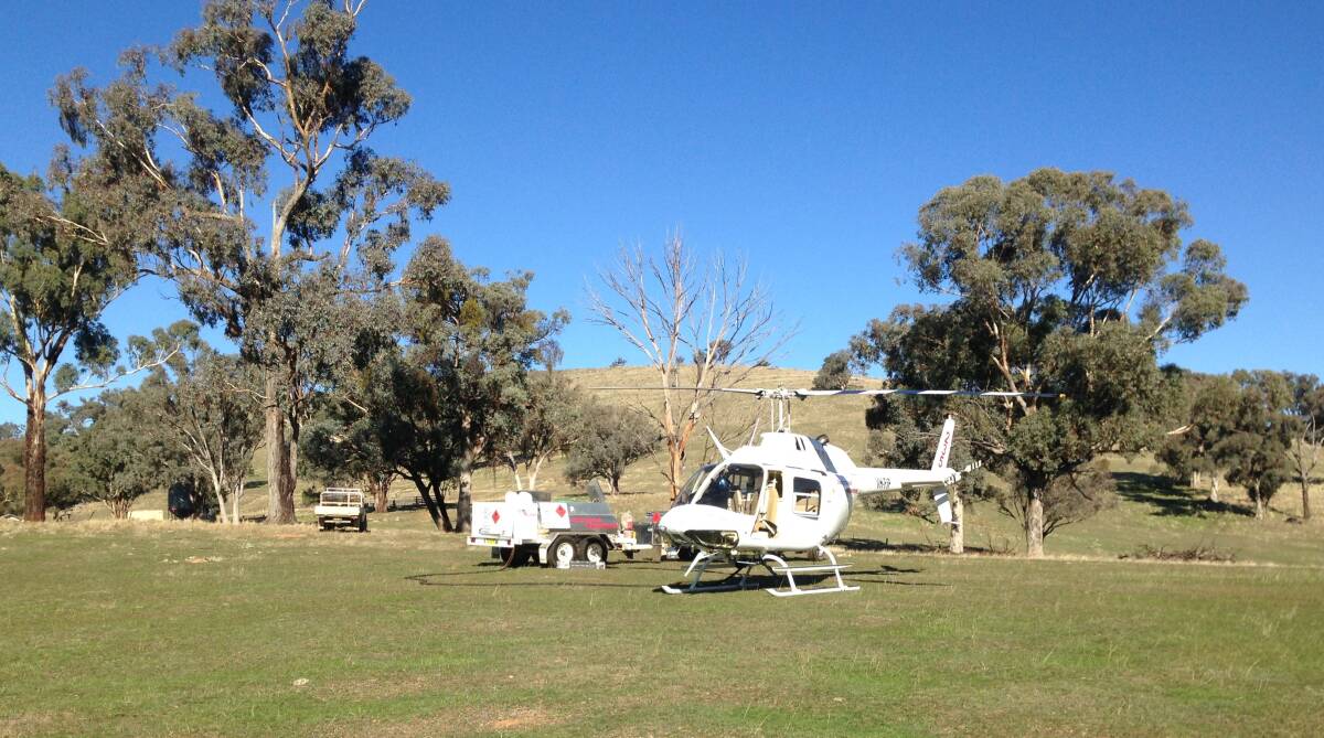 THE HUNT IS ON: A chopper ready to take off from Trunkey Creek as part of the feral pest cull. Photo: CONTRIBUTED