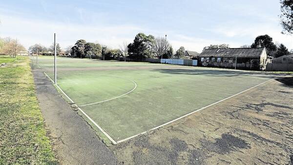 WHAT'S IN STORE: Reader Loretta Power is concerned about what will become of the site of the Moulder Park netball courts. Photo: FILE PHOTO