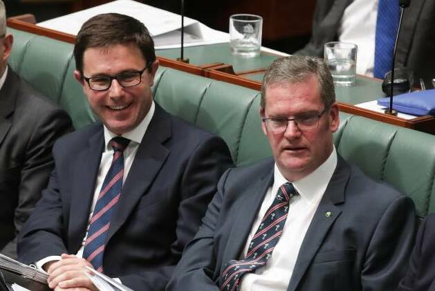 JOB DONE: Agriculture and Water Resources Minister David Littleproud (left) and Regional Development Minister John McVeigh.