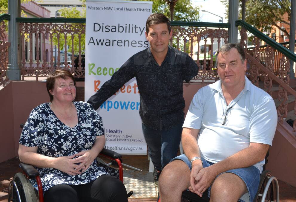 EMPOWERING: Paralympian Ben Austin OAM (back) with Meg Jones and Ross Mason at the launch of Western NSW Local Health District's Disability Inclusion Plan.