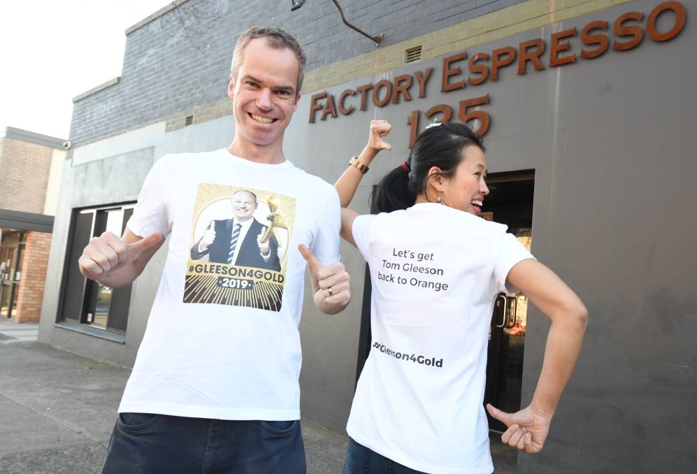 HELP A BROTHER OUT: Nick and Ruby Gleeson sporting the t-shirts they hope will propel Nick's brother Tom to the Gold Logie on Sunday. Photo: JUDE KEOGH