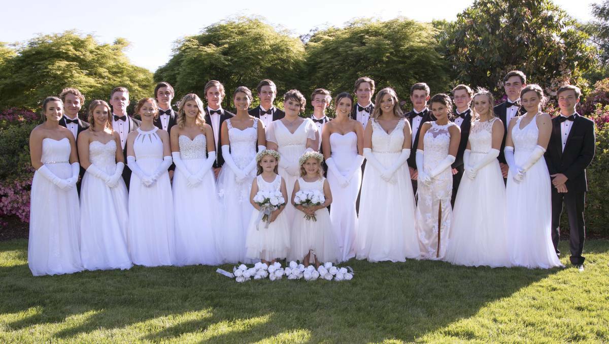 DOING THEIR PART: Kinross Wolaroi School's debutantes and their partners at last weekend's ball, which raised funds for Orange's domestic violence shelter.